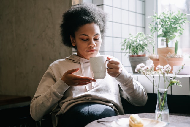 Pregnant woman drinking emergen-C while pragnent