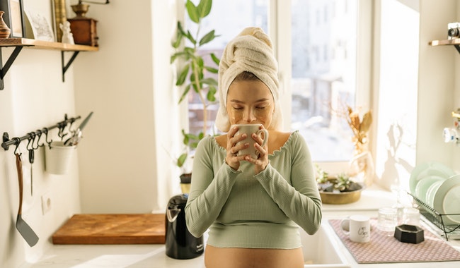 Pregnant woman drinking protain shake during pregnancy