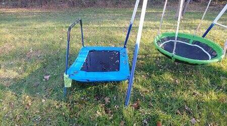 Swing Set and Trampoline on the ground