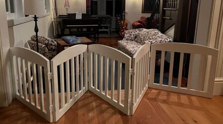 White Freestanding Baby Gate in my living room