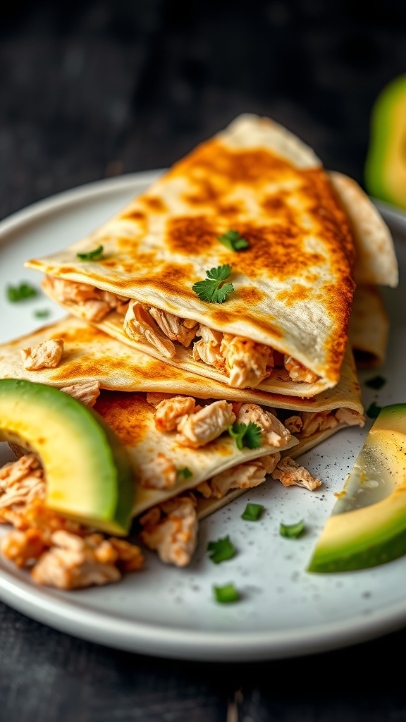 Delicious chicken quesadillas with avocado slices on a plate